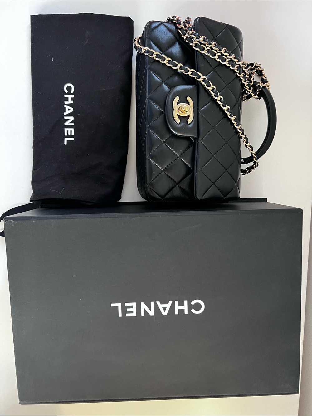 CHANEL Black Quilted Leather Crossbody with Gold Chain